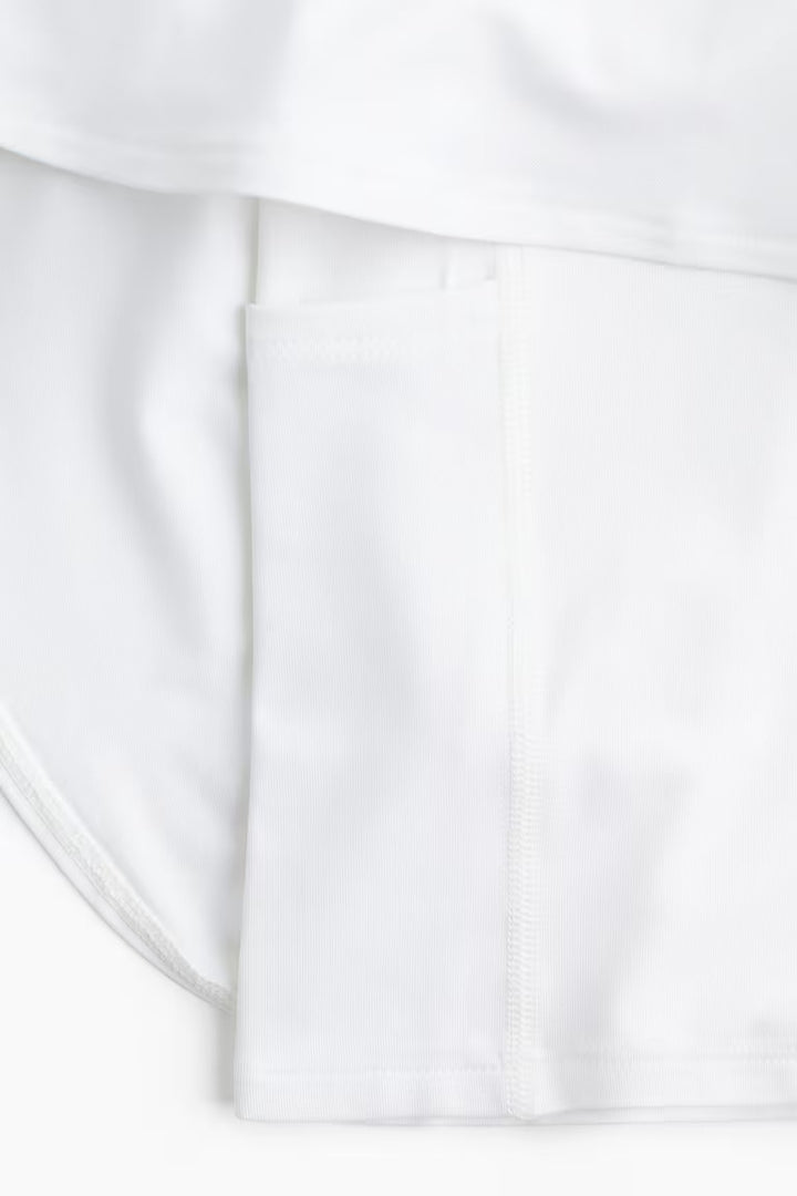H&M TENNIS CIRCLE SKIRT IN DRYMOVE™