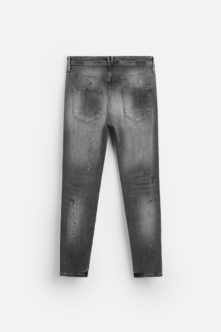 ZARA SPLATTERED RIPPED SKINNY JEANS