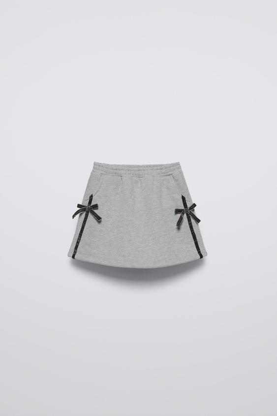 Zara PLUSH SKIRT WITH BOWS