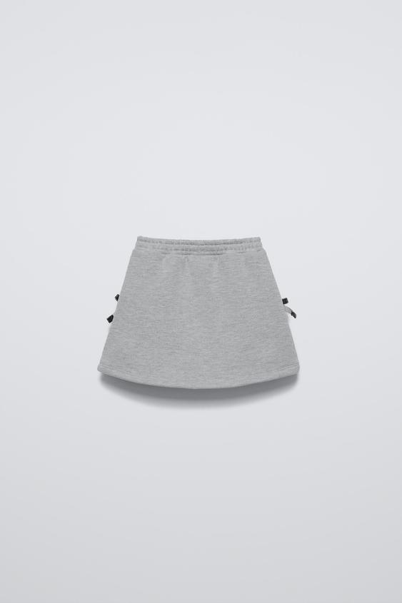 Zara PLUSH SKIRT WITH BOWS