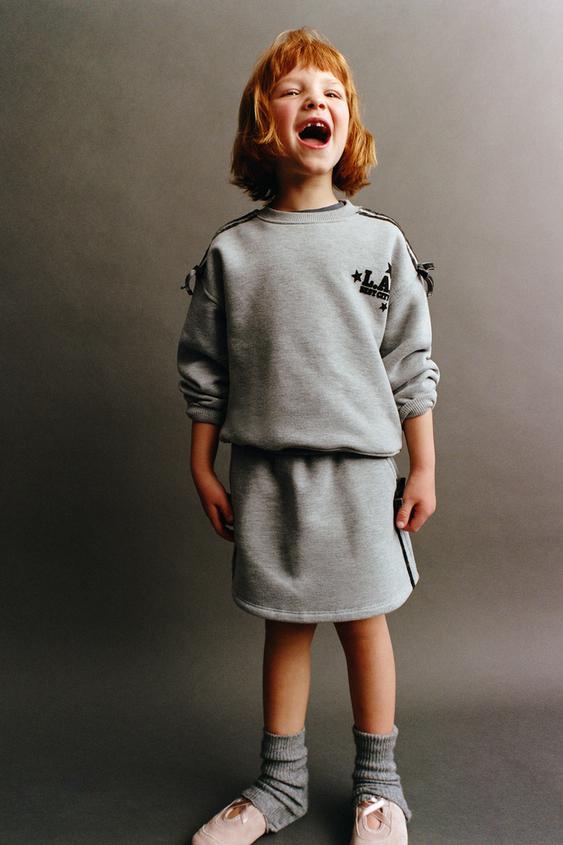 Zara PLUSH SKIRT WITH BOWS