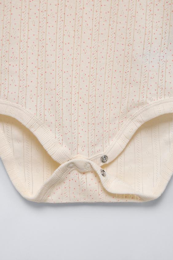 Zara FIVE PACK OF FLOWER BODYSUITS