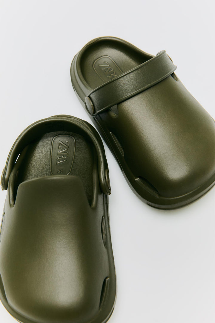 Zara Rubber pool clogs. Back elastic strap for a better fit. Rubber soles.