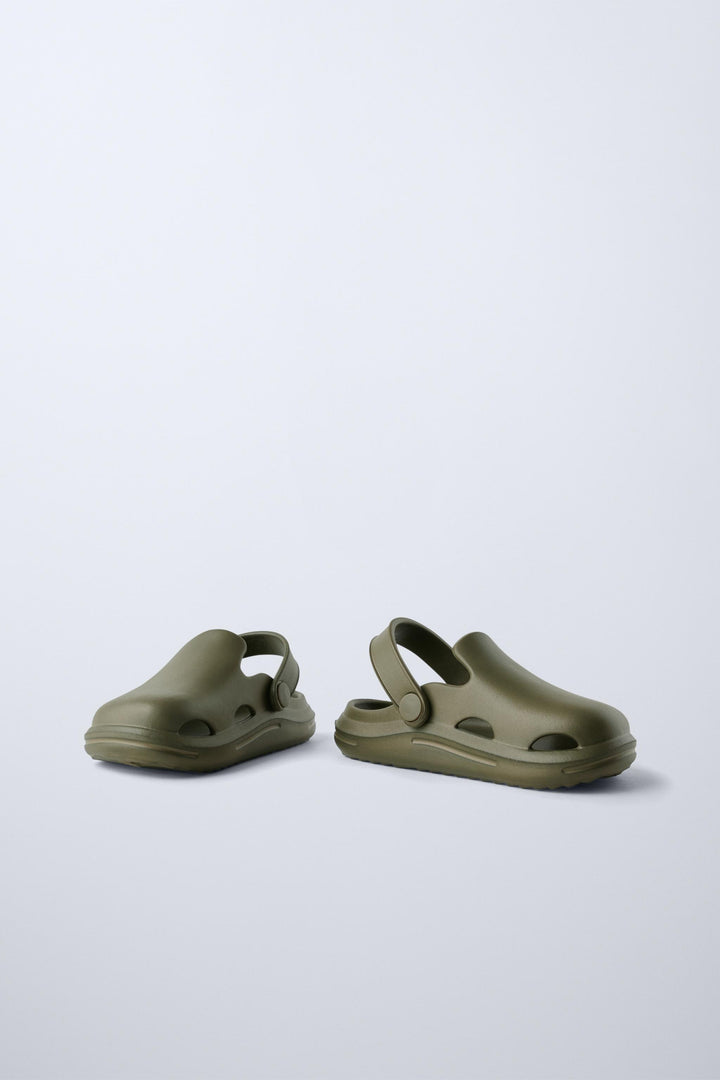 Zara Rubber pool clogs. Back elastic strap for a better fit. Rubber soles.