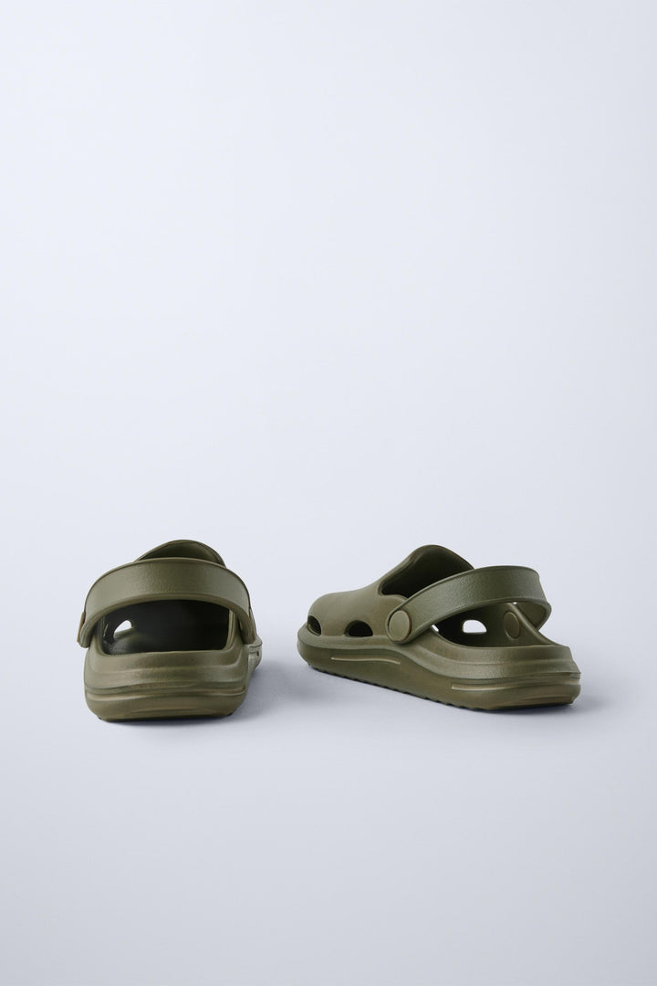 Zara Rubber pool clogs. Back elastic strap for a better fit. Rubber soles.