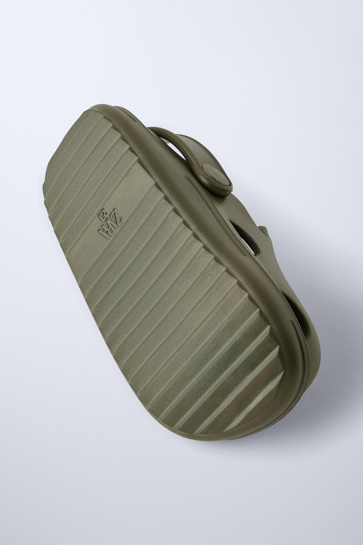 Zara Rubber pool clogs. Back elastic strap for a better fit. Rubber soles.