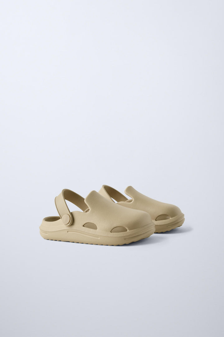 Zara Rubber pool clogs. Back elastic strap for a better fit. Rubber soles.