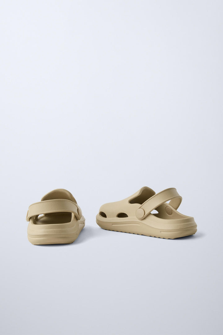 Zara Rubber pool clogs. Back elastic strap for a better fit. Rubber soles.