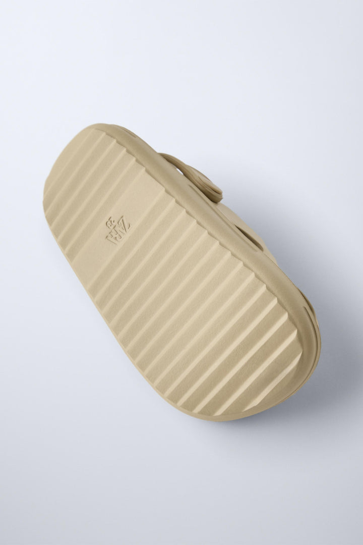 Zara Rubber pool clogs. Back elastic strap for a better fit. Rubber soles.