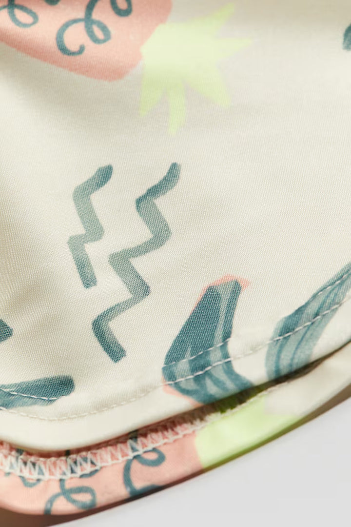 H&M SUN CAP UPF 50+