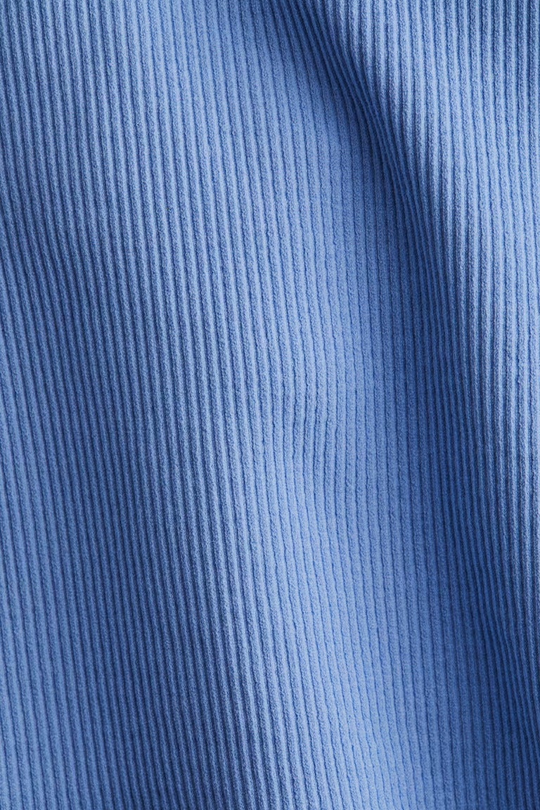 H&M SEAMLESS MEDIUM-SUPPORT SPORTS BRA WITH DRYMOVE™