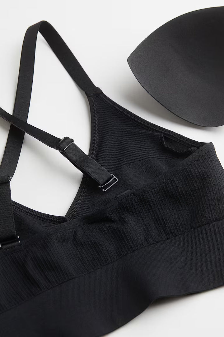 H&M SEAMLESS MEDIUM-SUPPORT SPORTS BRA WITH DRYMOVE™