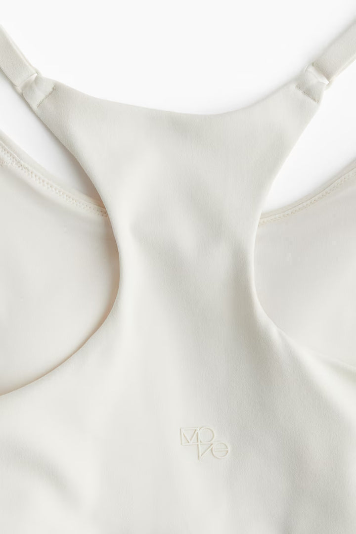 H&M LIGHT SUPPORT SPORTS BRA WITH SOFTMOVE™ LYCRA®