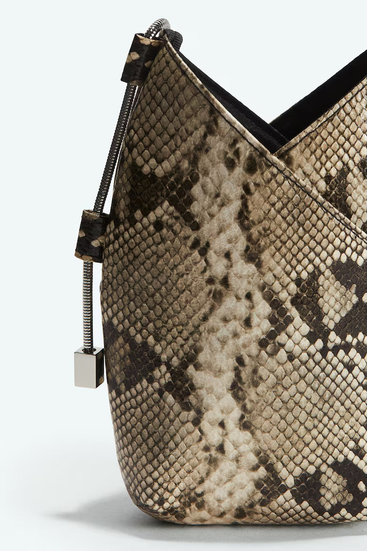 H&M PATTERNED PHONE BAG