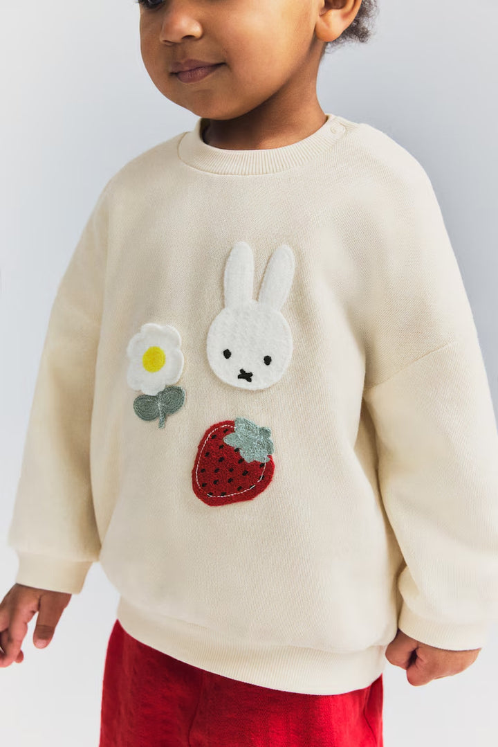H&M APPLIQUÉD SWEATSHIRT
