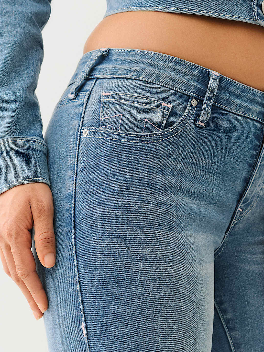 TRUE RELIGION ONLINE EXCLUSIVE JENNIE MID RISE CURVY SKINNY JEAN