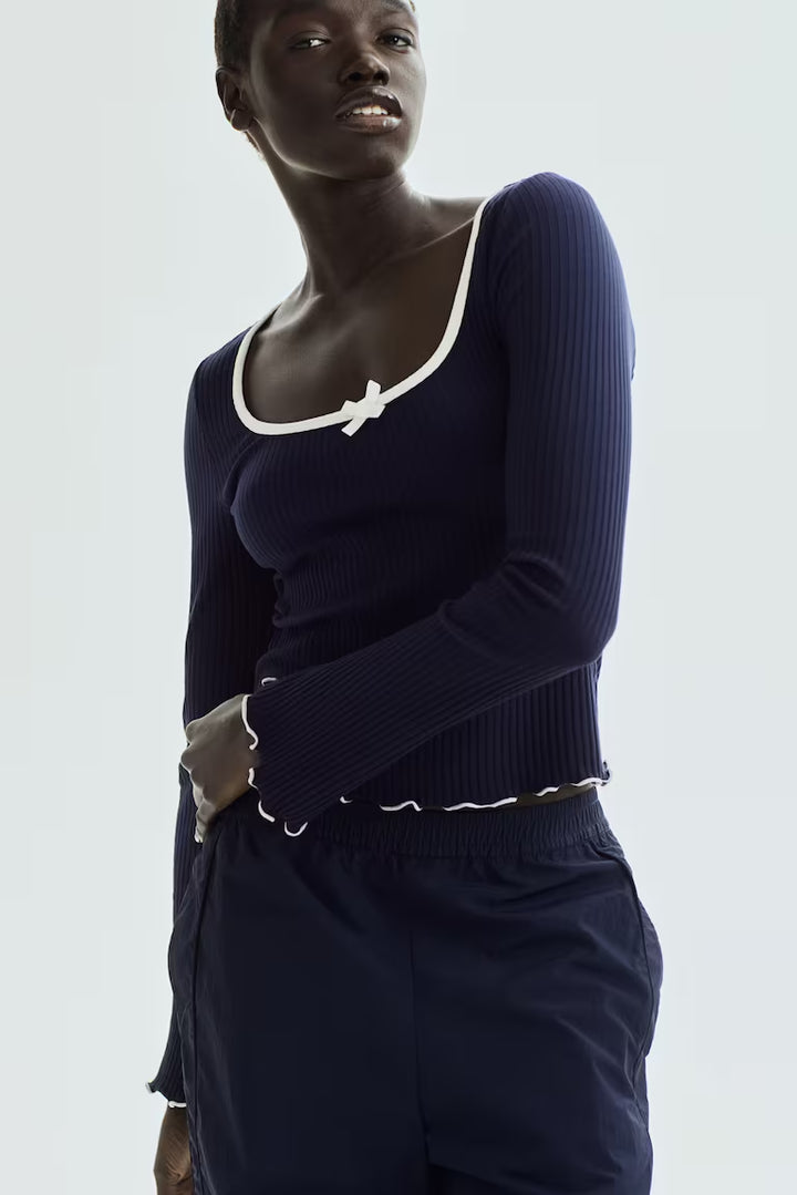 H&M RIBBED TOP WITH OVERLOCKED TRIM