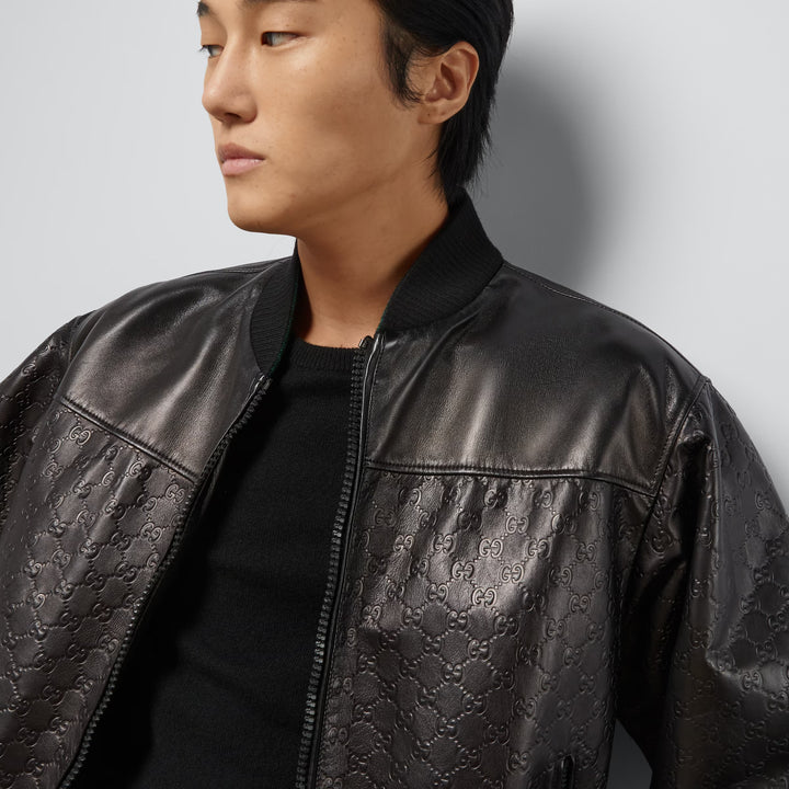 Gucci GG embossed leather bomber jacket