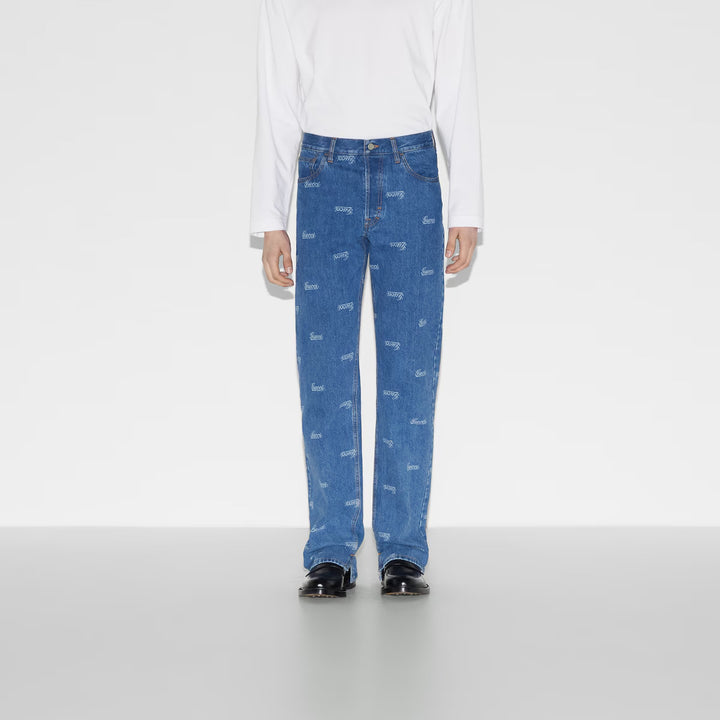 GUCCI DENIM PANT WITH LASERED GUCCI DETAIL