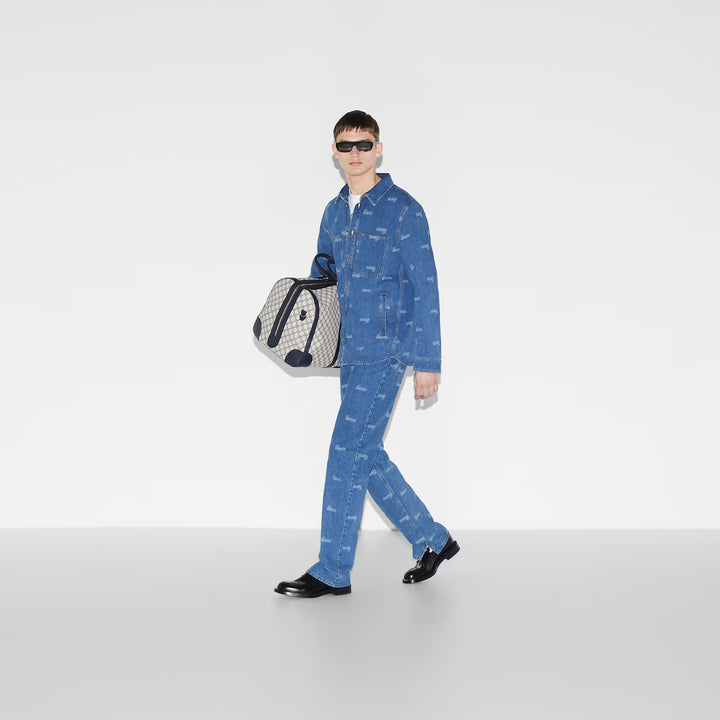 GUCCI DENIM PANT WITH LASERED GUCCI DETAIL