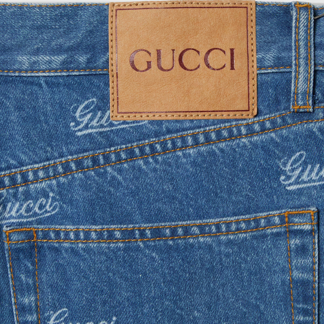 GUCCI DENIM PANT WITH LASERED GUCCI DETAIL