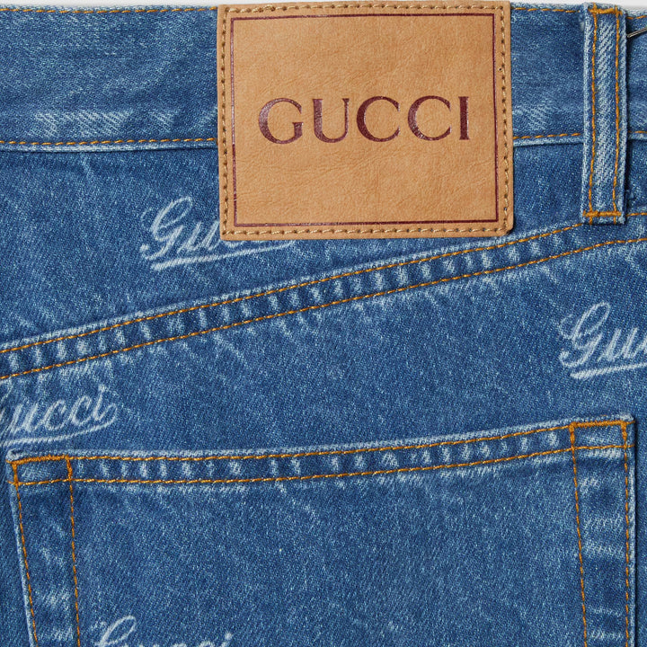 GUCCI DENIM PANT WITH LASERED GUCCI DETAIL
