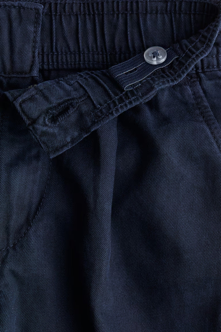 H&M LOOSE-FIT TAPERED TWILL CHINOS