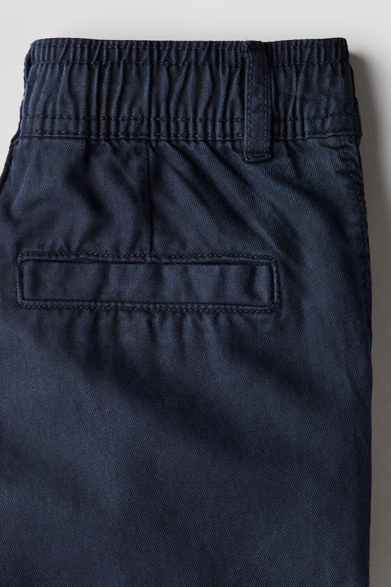 H&M LOOSE-FIT TAPERED TWILL CHINOS