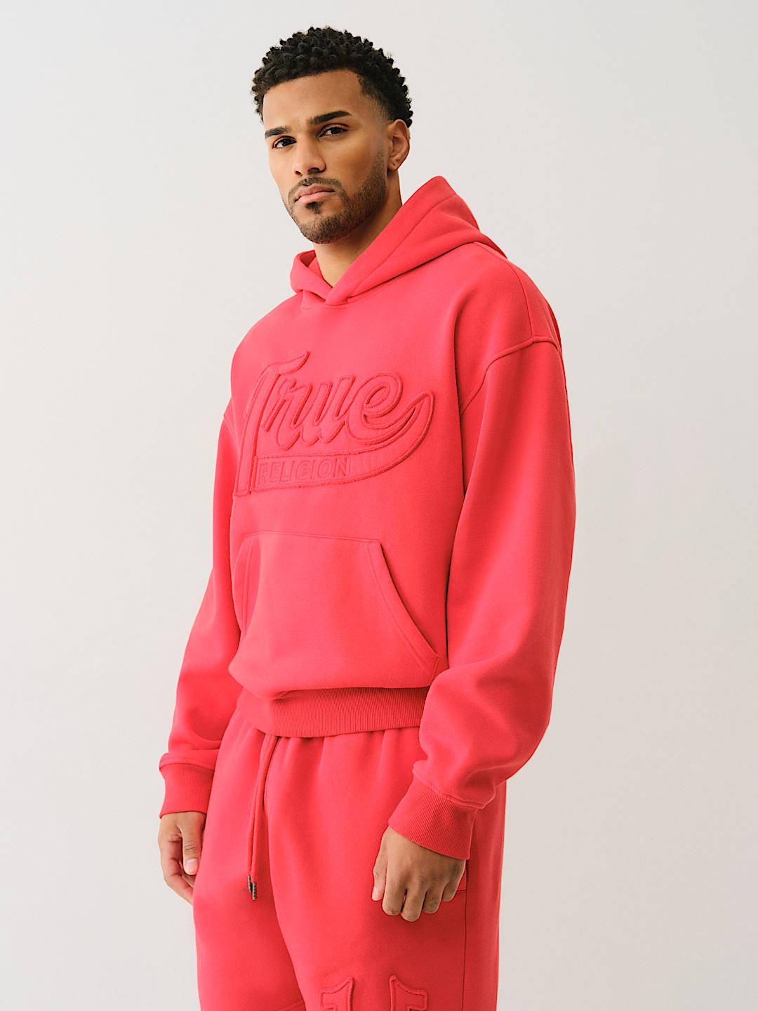 TRUE RELIGION CINCHED LOGO APPLIQUE HOODIE