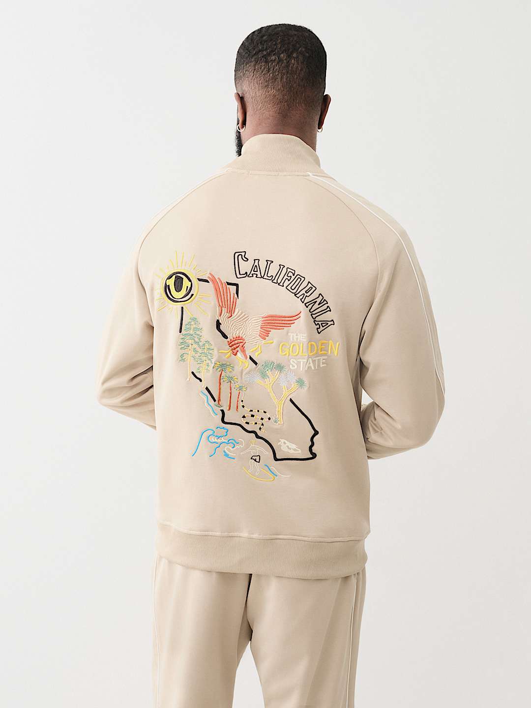 TRUE RELIGION EMBROIDERED GOLDEN STATE TRACK JACKET