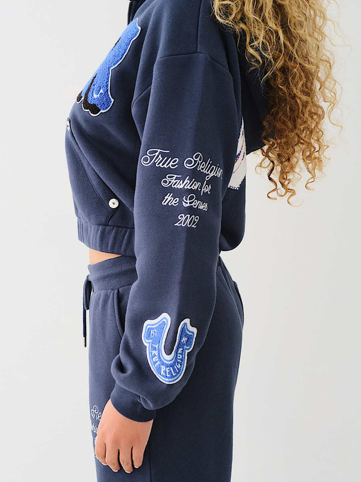 TRUE RELIGION CRYSTAL PATCH ZIP VARSITY HOODIE