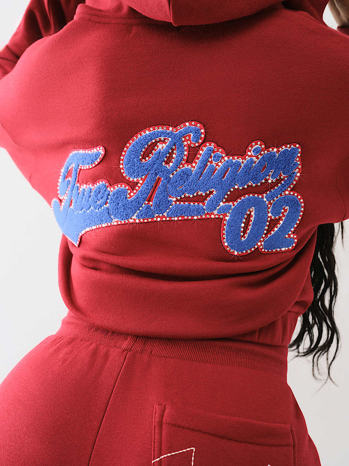 TRUE RELIGION CRYSTAL PATCH ZIP VARSITY HOODIE