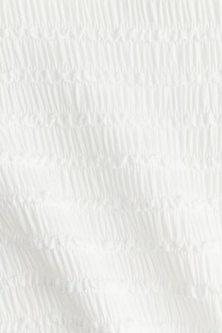 H&M SMOCKED TOP WITH OVERLOCKED TRIM