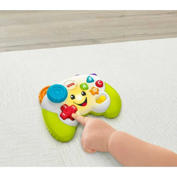 Fisher-Price Laugh & Learn Game & Learn Controller Musical Baby Toy with Lights, Multilanguage Version, Ages 6-36M