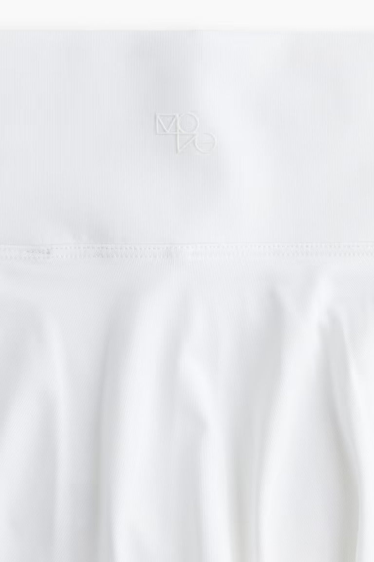 H&M TENNIS CIRCLE SKIRT IN DRYMOVE™