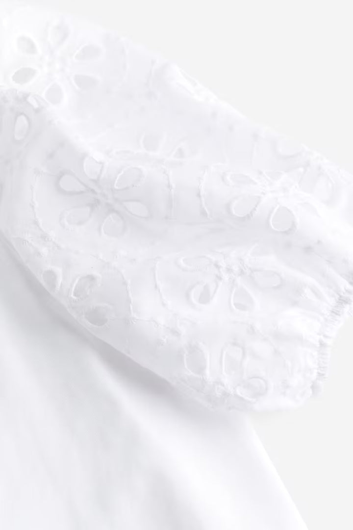 H&M TOP WITH EYELET EMBROIDERED SLEEVES