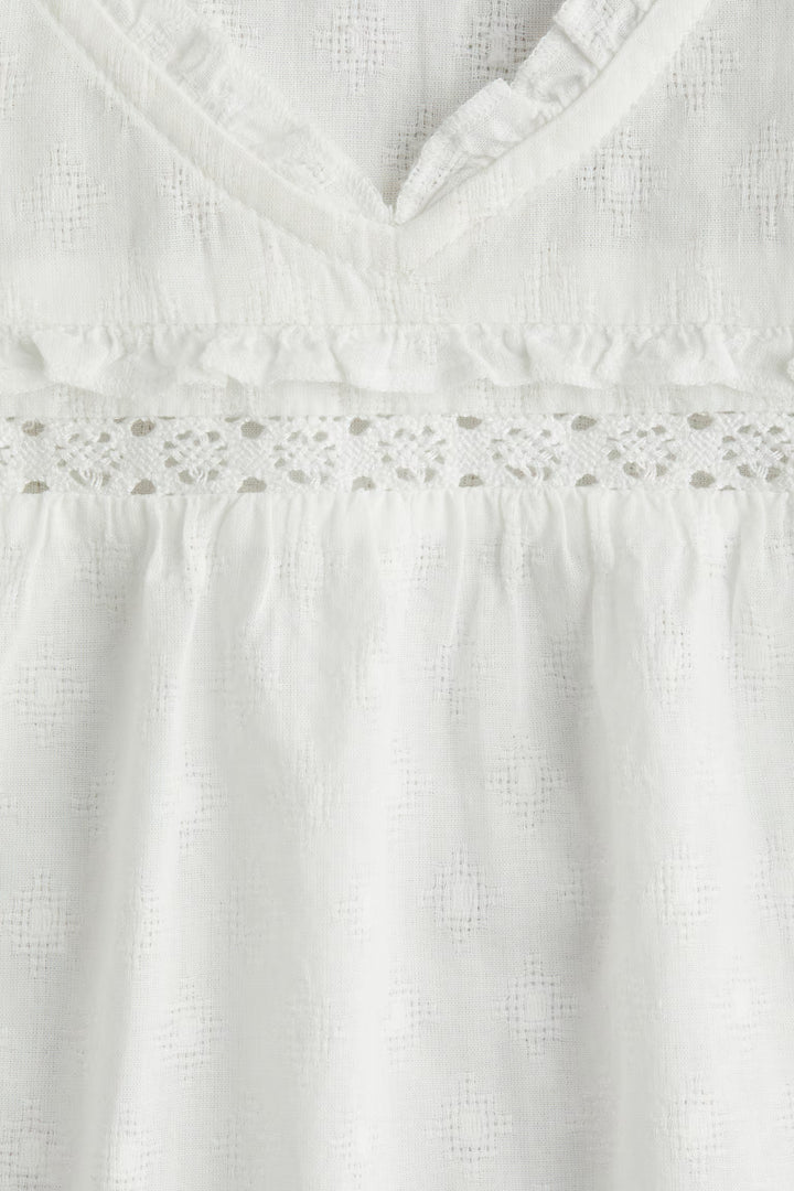 H&M Ruffle-Trimmed Cotton Blouse