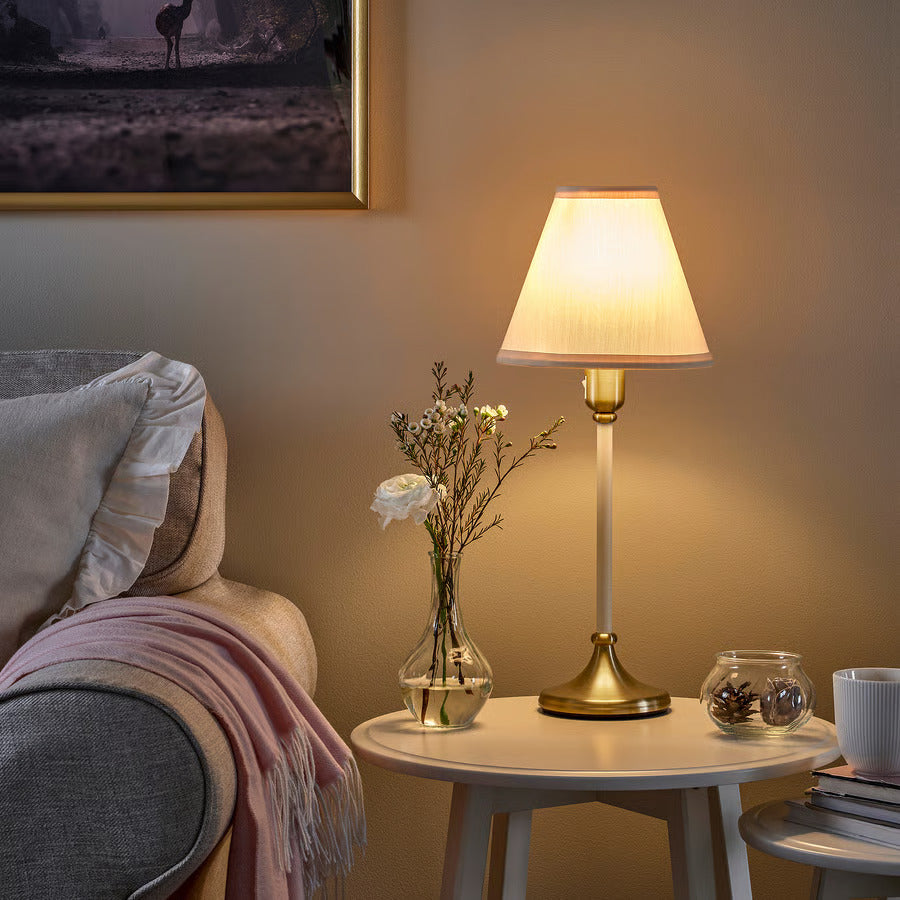 IKEA FLYGHÖJD Table lamp, brass/beige, 21 "
