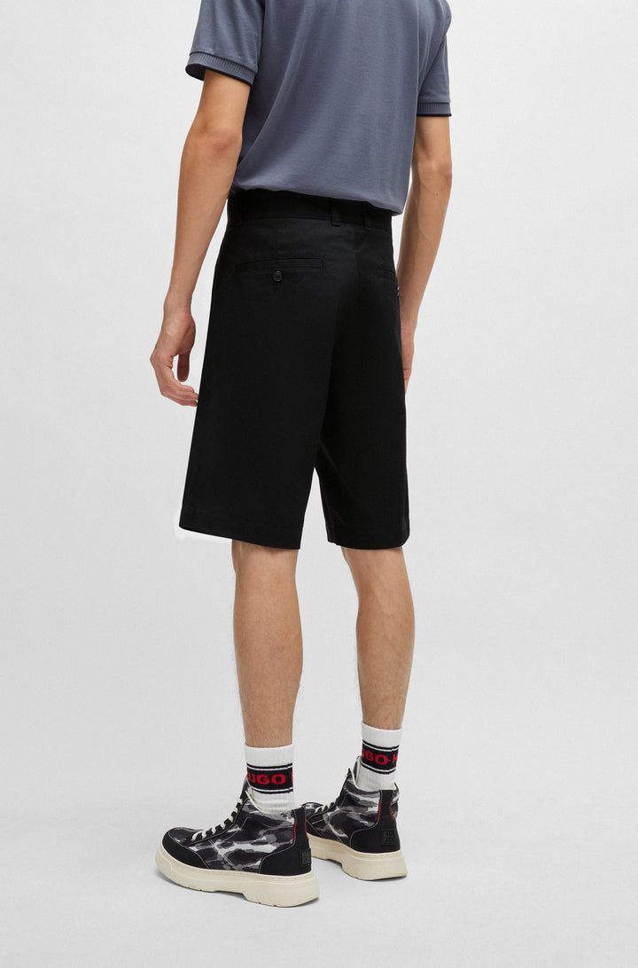Hugo Regular-fit shorts with slim leg and buttoned pockets