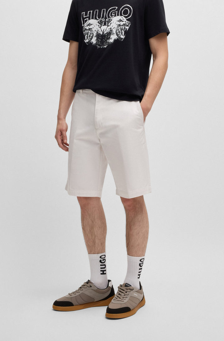 Hugo Regular-fit shorts with slim leg and buttoned pockets
