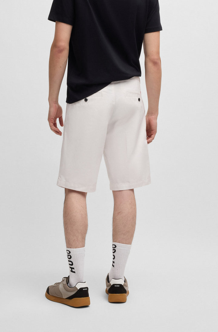 Hugo Regular-fit shorts with slim leg and buttoned pockets