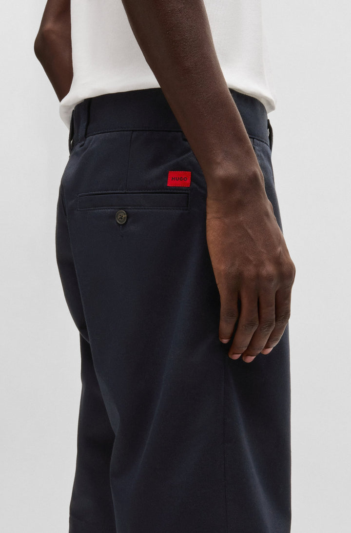 Hugo Regular-fit shorts with slim leg and buttoned pockets