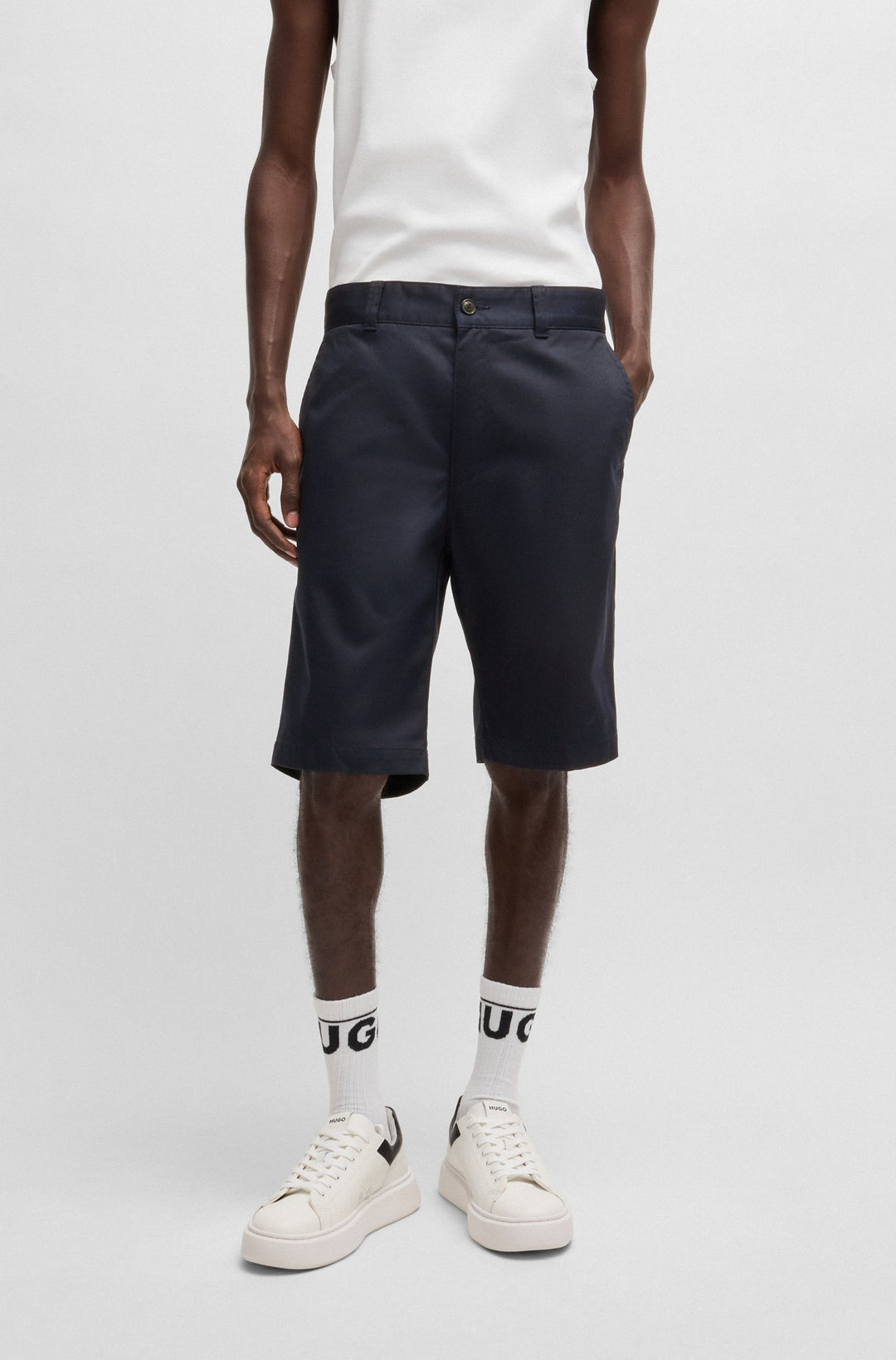 Hugo Regular-fit shorts with slim leg and buttoned pockets