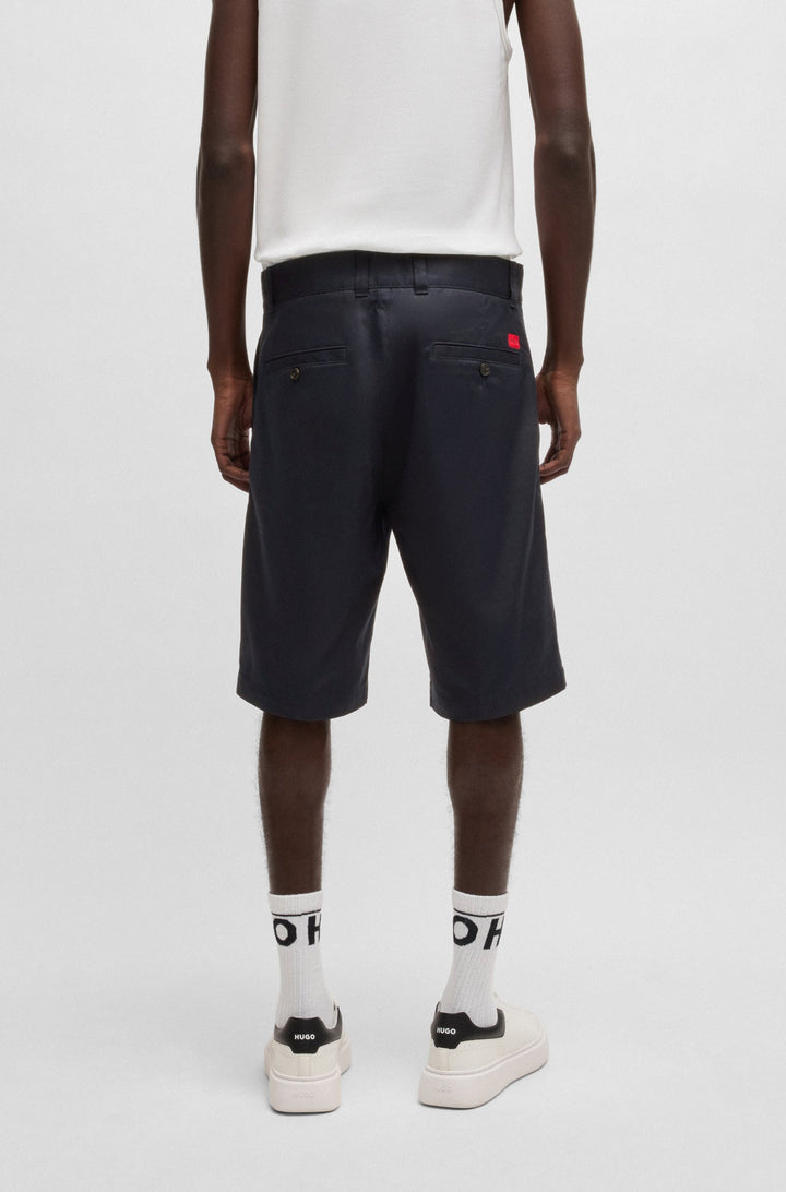 Hugo Regular-fit shorts with slim leg and buttoned pockets