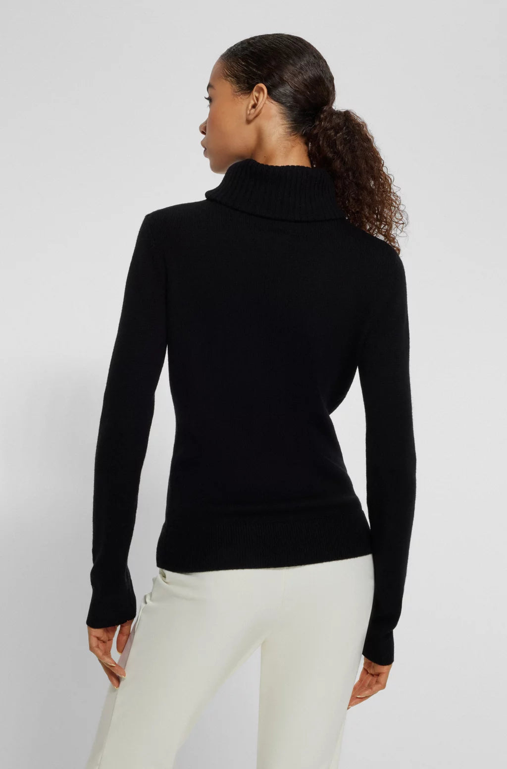 BOSS X PERFECT MOMENT SLOGAN SWEATER IN VIRGIN WOOL