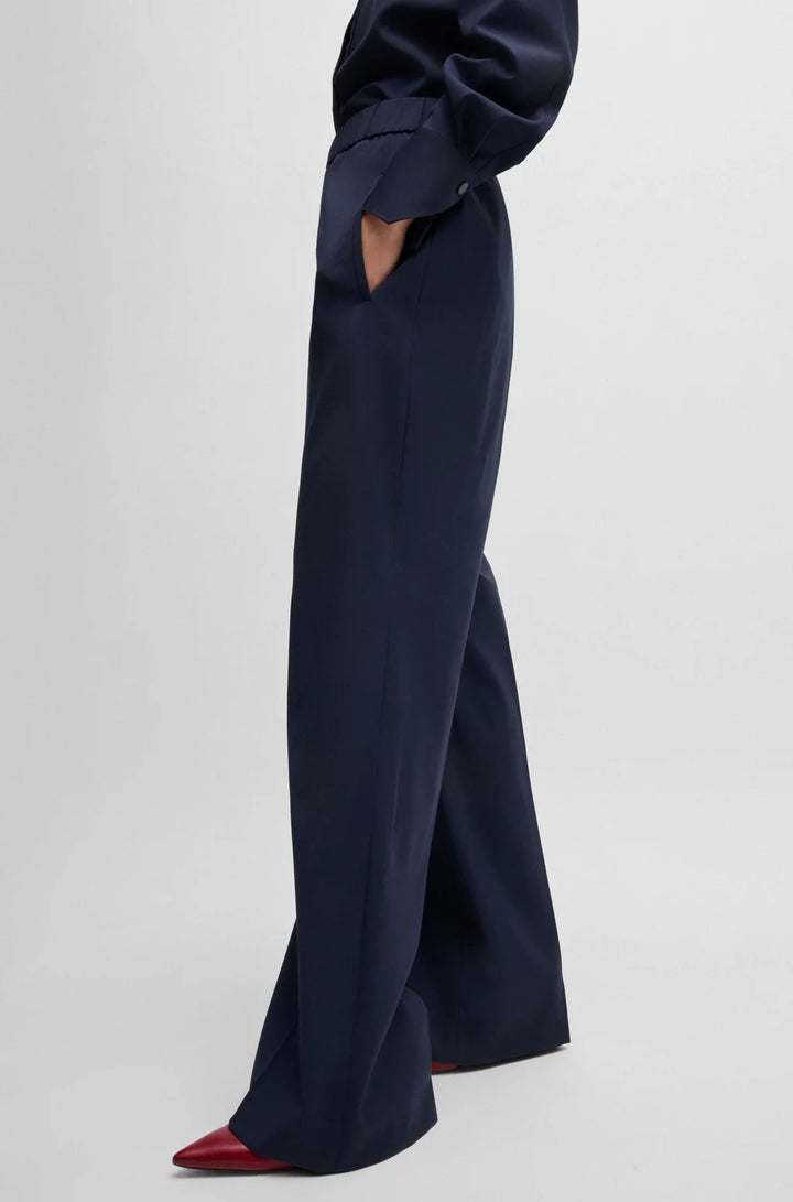 BOSS RELAXED-FIT TROUSERS IN WOOL