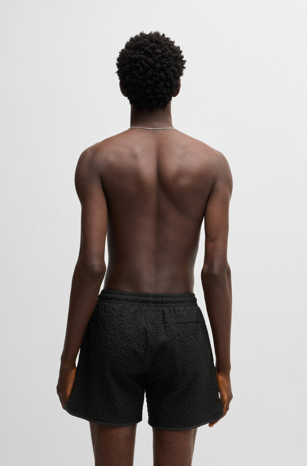 Hugo Waffle-structured swim shorts with embroidered stacked logo