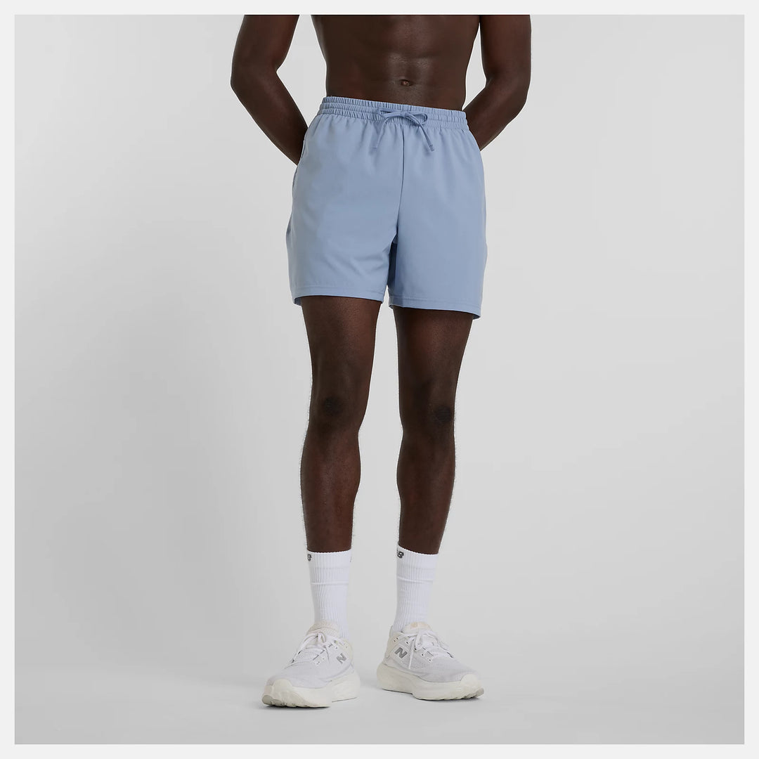 New Balance Men Clothing Shorts Sport Essential Short 5"