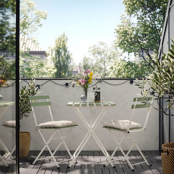 IKEA TÄRNÖ Table+2 chairs, outdoor, white/green foldable/foldable Kuddarna light gray-beige, 21 5/8x21 1/4 "