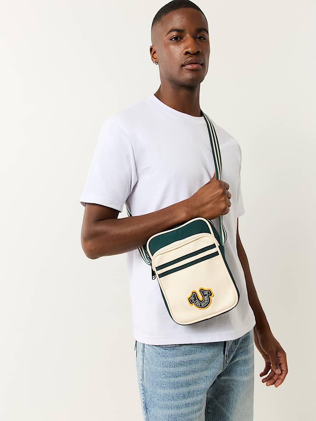 TRUE RELIGION COLLEGIATE SLING BAG